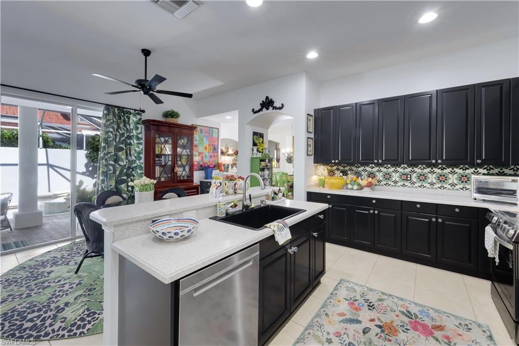 Center Island, black granite/stone sink, hard surface counters