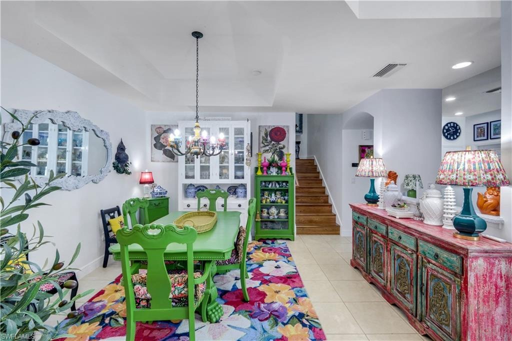 Stairway is to 2nd Level, to the right into the Kitchen space