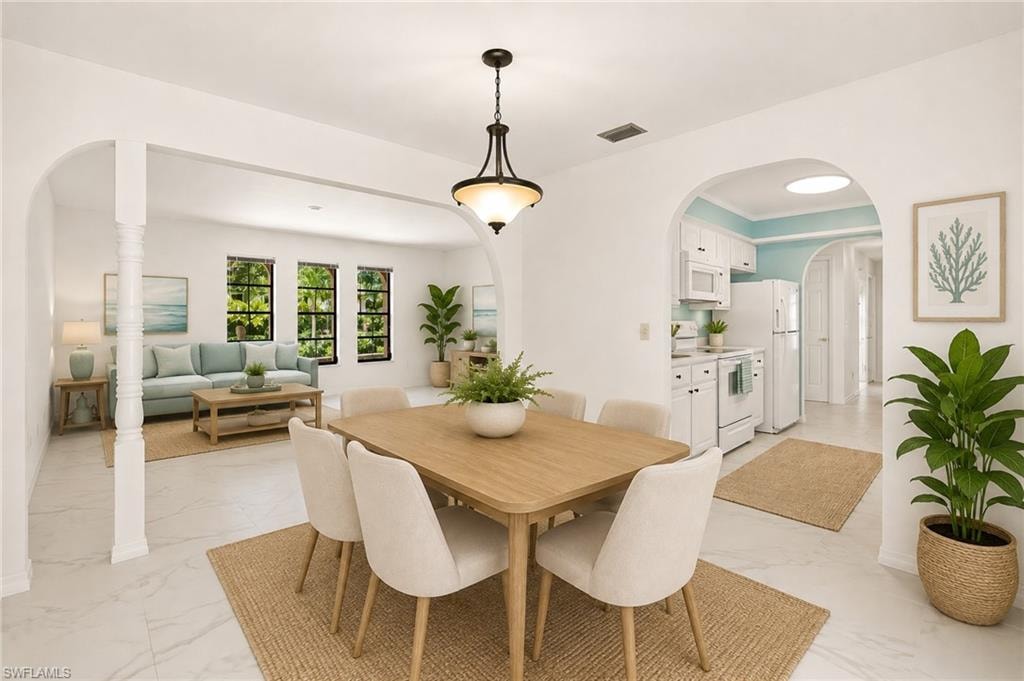 VIRTUAL Archway entryways, wood-finish flooring, recessed lighting, white cabinetry, and a skylight