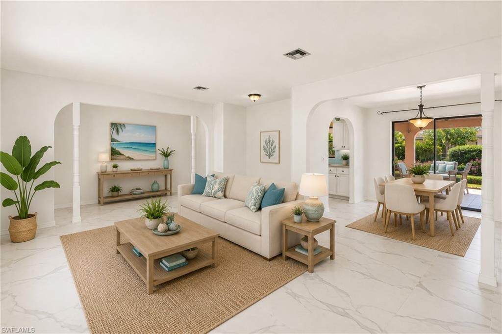 VIRTUAL Sliding glass doors opening to an outdoor patio, ceiling fan, neutral tile flooring, light-toned walls, and wood-finish bedroom furniture