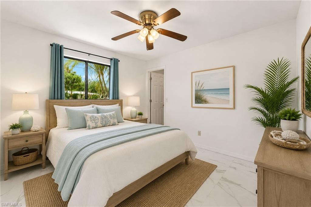 VIRTUAL White wall finishes, wood-finish flooring, ceiling fan with integrated lighting, window with exterior landscaping, and a wood-finish bed frame