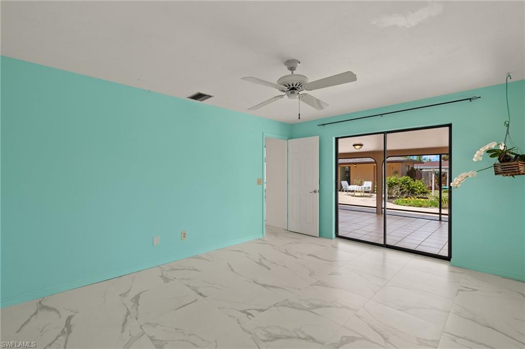 White tile flooring with grey veining