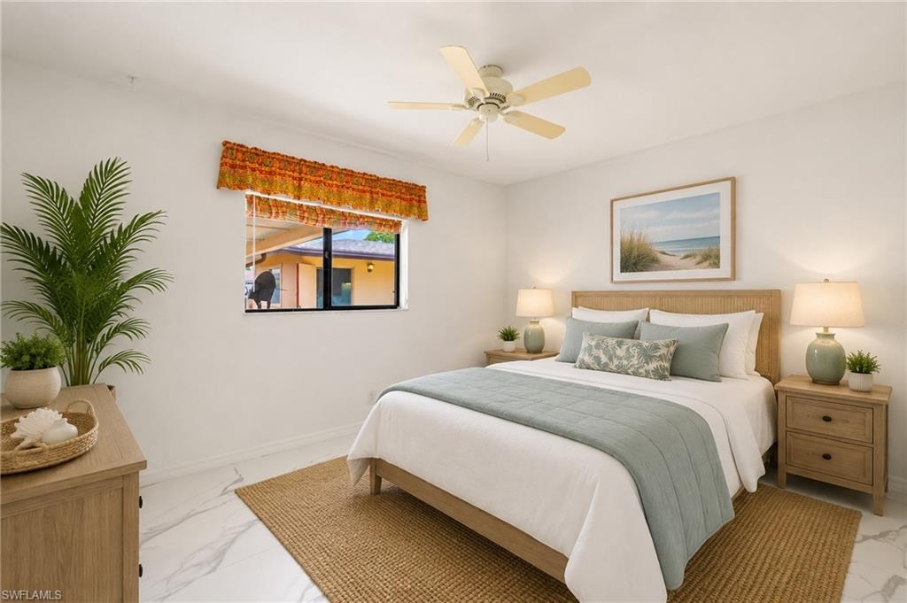 VIRTUAL White walls, ceiling fan, window with exterior building visible, wood-finish flooring