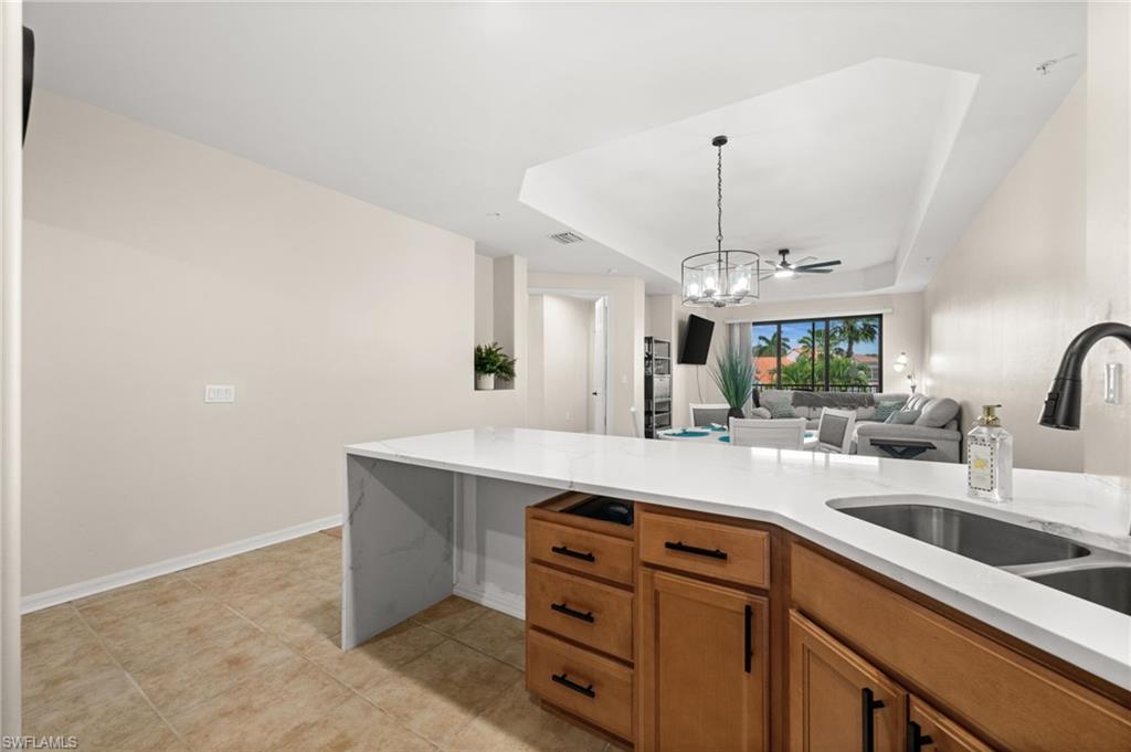 The kitchen even offers a space where you could put a chair!