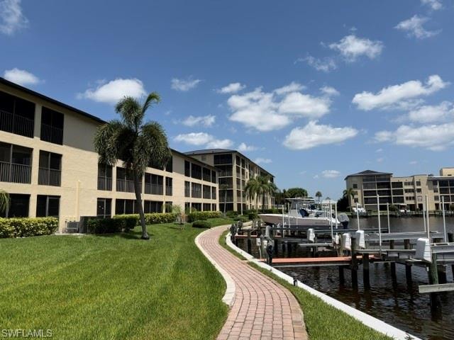 walk way around the building leads to and from the pool area