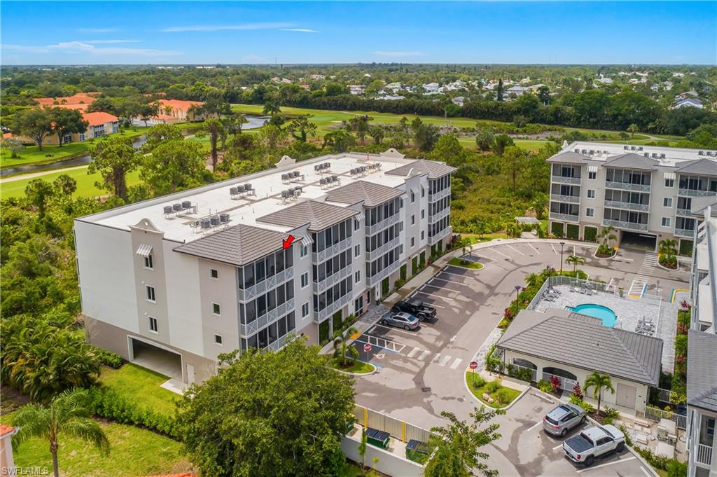 Modern multi-story residential building with screened balconies