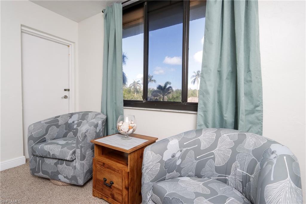Sitting room with carpet floors