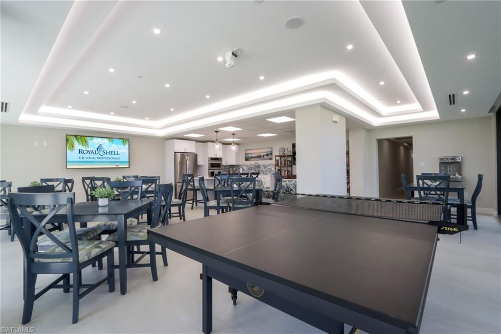 Playroom featuring a tray ceiling