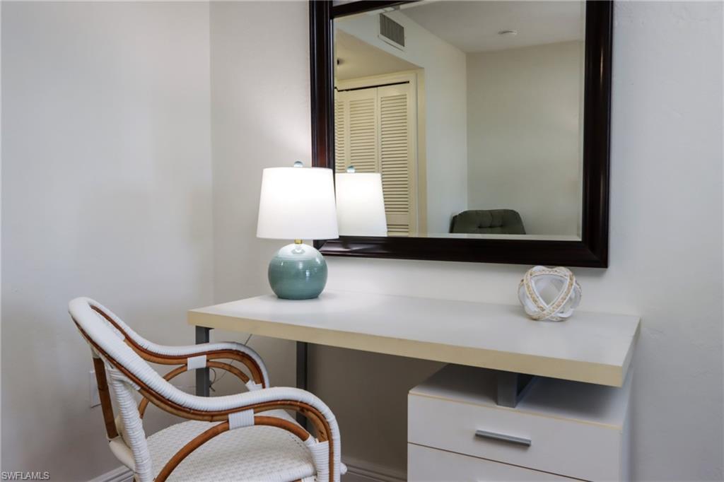 Office area featuring baseboards