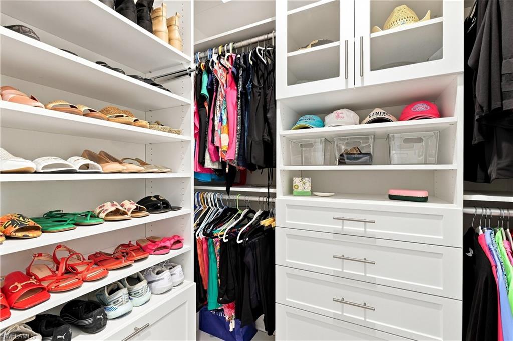 Dual walk-in closets with built-ins