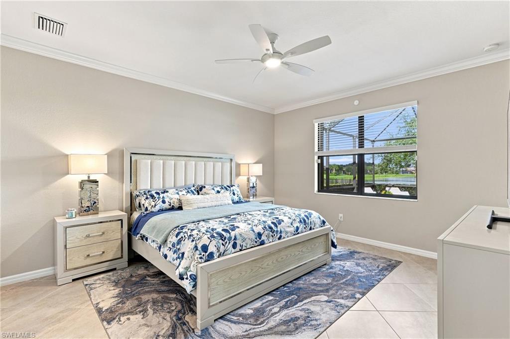 Pool & lakeview in the primary bedroom