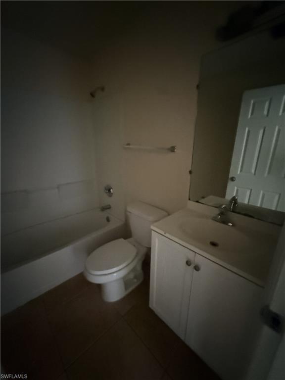 White vanity with dual cabinet doors and integrated sink