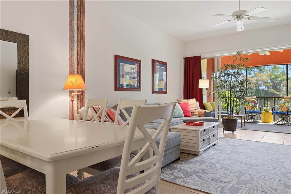 Recessed lighting, ceiling fan, and tile flooring extend to the outdoor screened patio