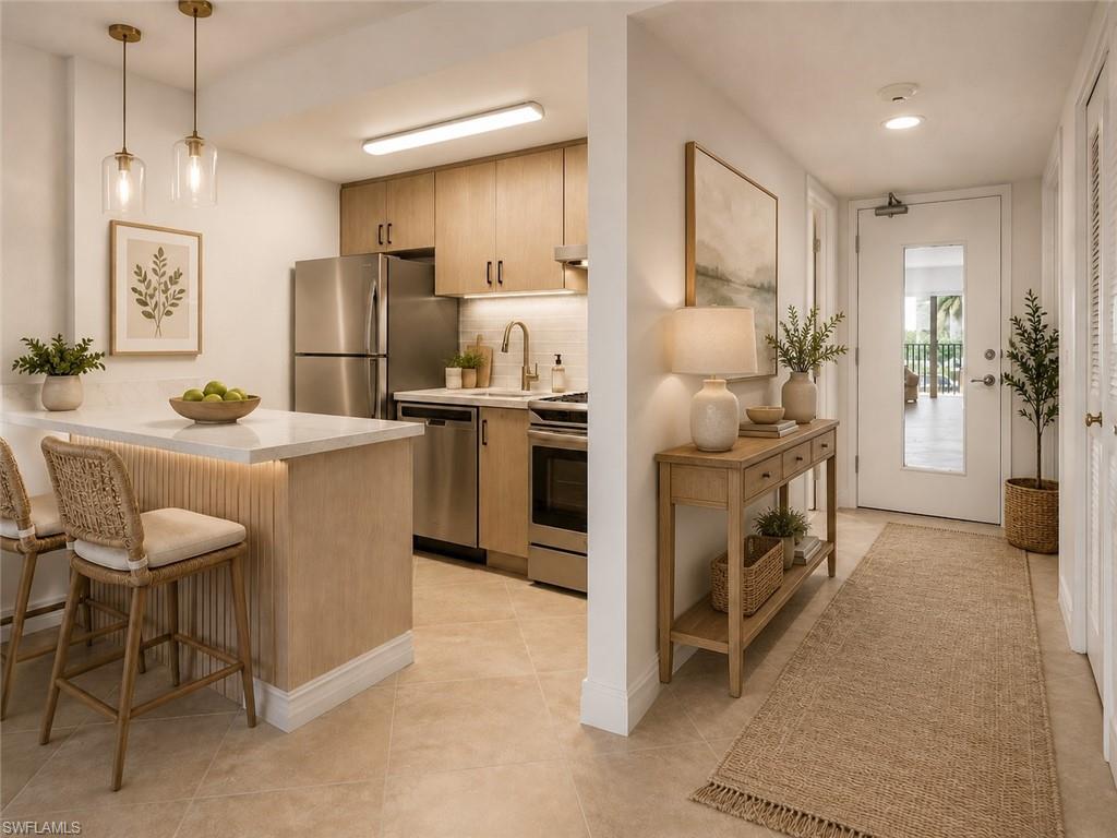 Kitchen and Foyer Virtually Staged