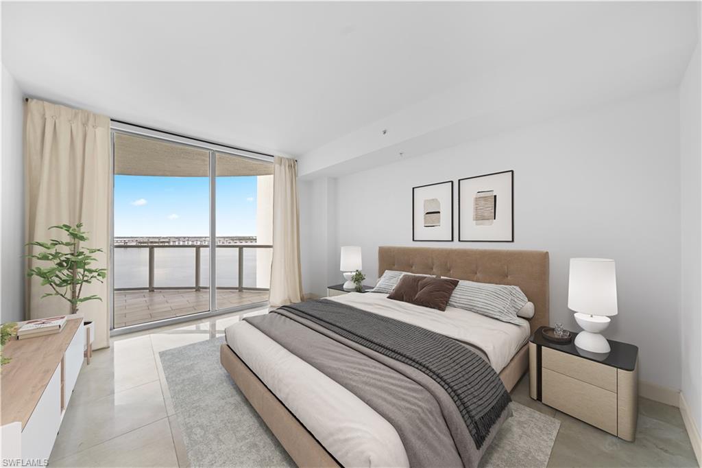 STAGED Pic; Marble Tiled Floors & Sliders to Tiled Lanai's with EXPANSIVE Waterviews!