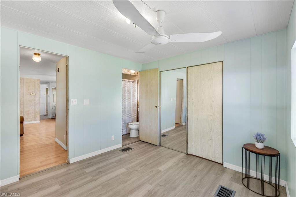 New flooring, paint front bedroom