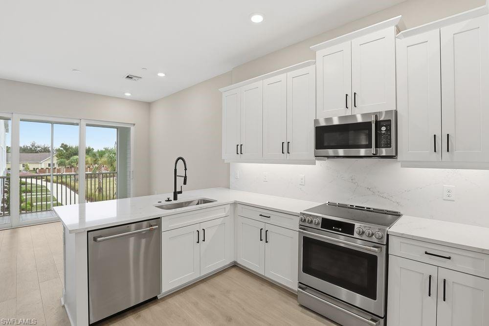 1624 Compass Pointe Court, Unit 203 - Ready Now!
