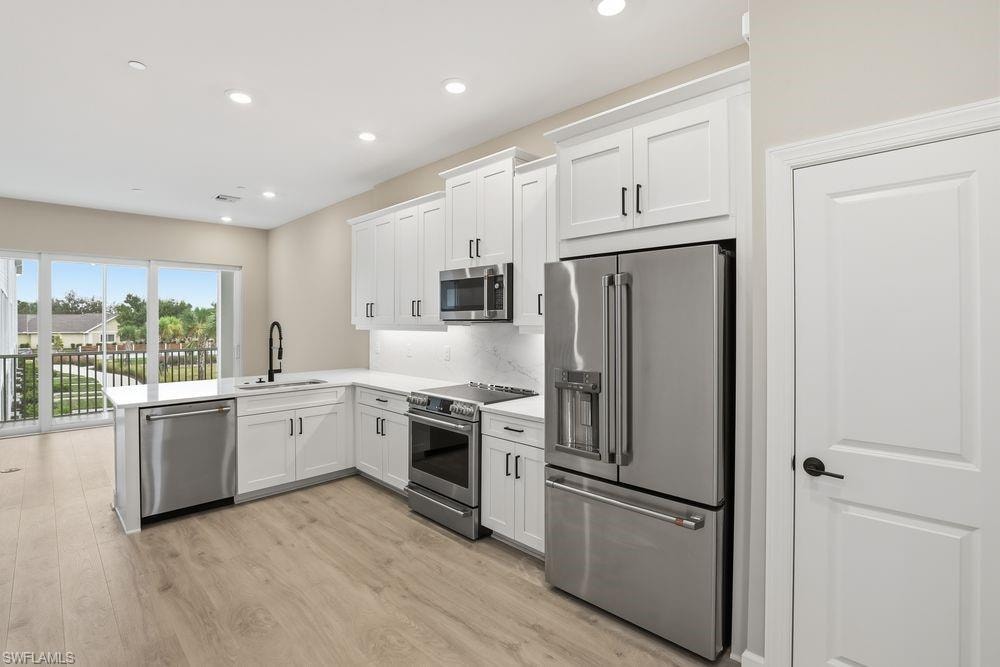 1624 Compass Pointe Court, Unit 203 - Ready Now!