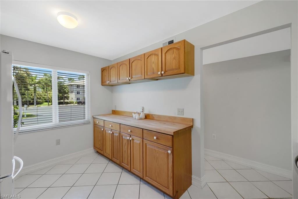 Extra work area features butcher block counter top
