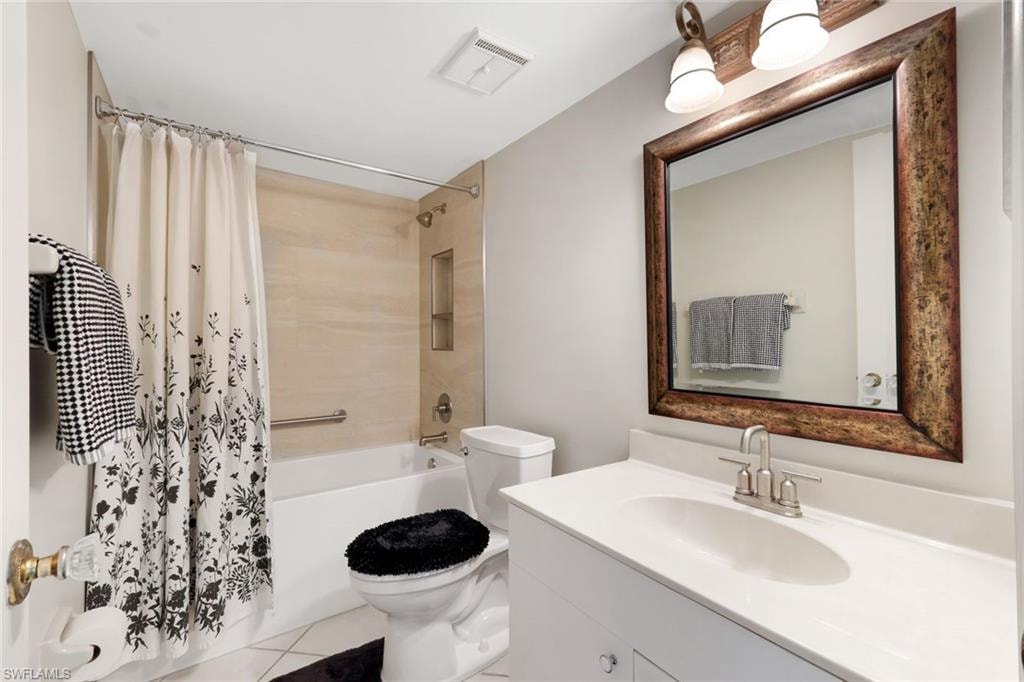 2nd Bath features new tub and grout-free surround system