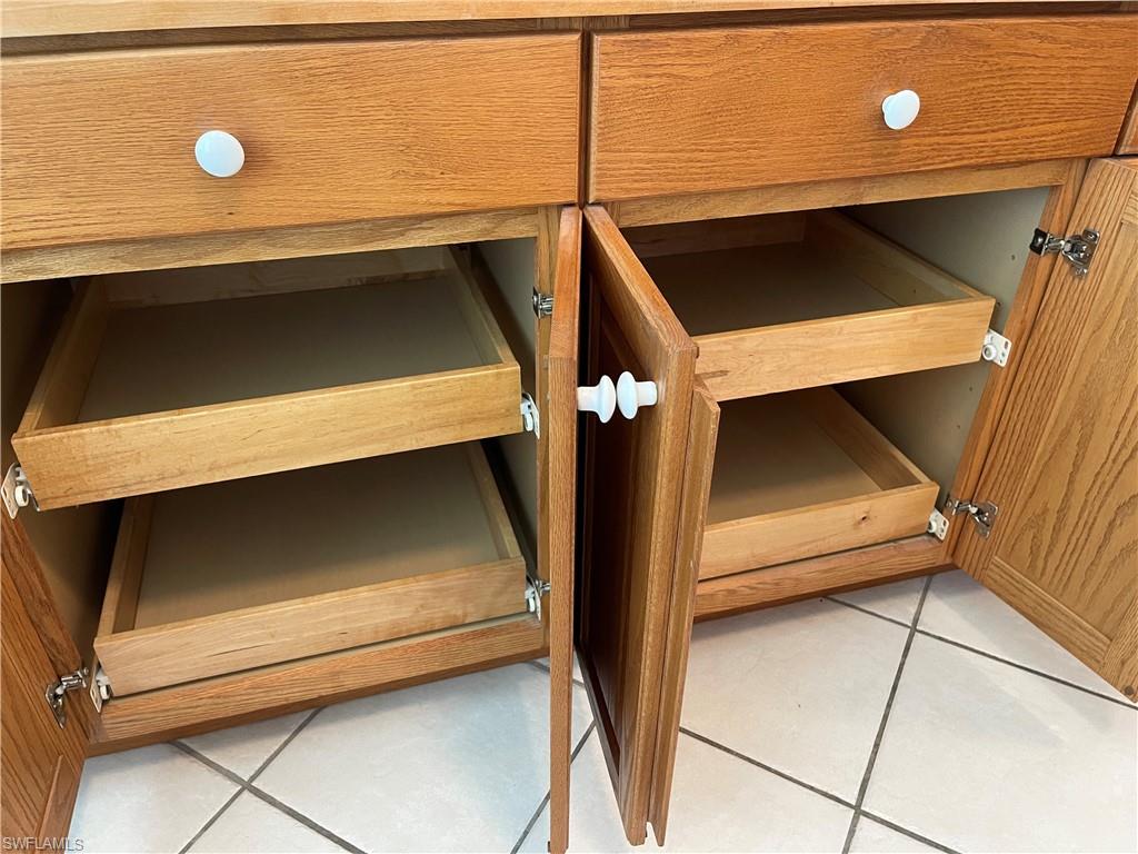 The all wood cabinets include pull-out drawers