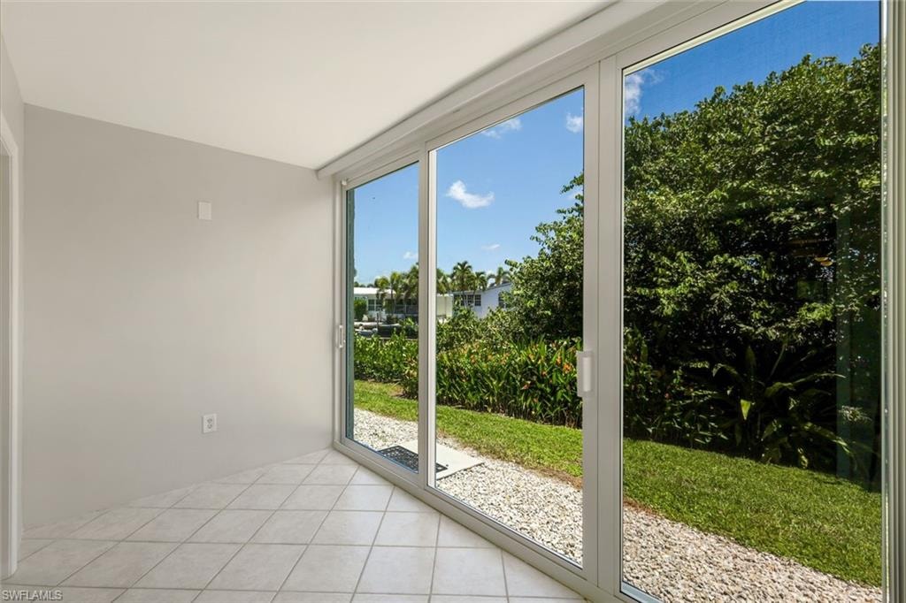 The lanai has been opened for add'l living area - impact sliders