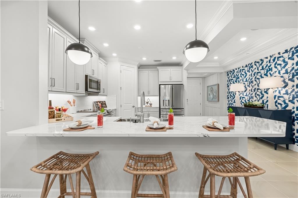 15339 Giardino Drive Unit 103 - Model Home Leaseback - Available Now for Closing!
