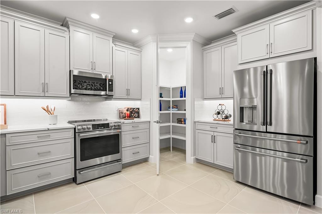 15339 Giardino Drive Unit 103 - Model Home Leaseback - Available Now for Closing!