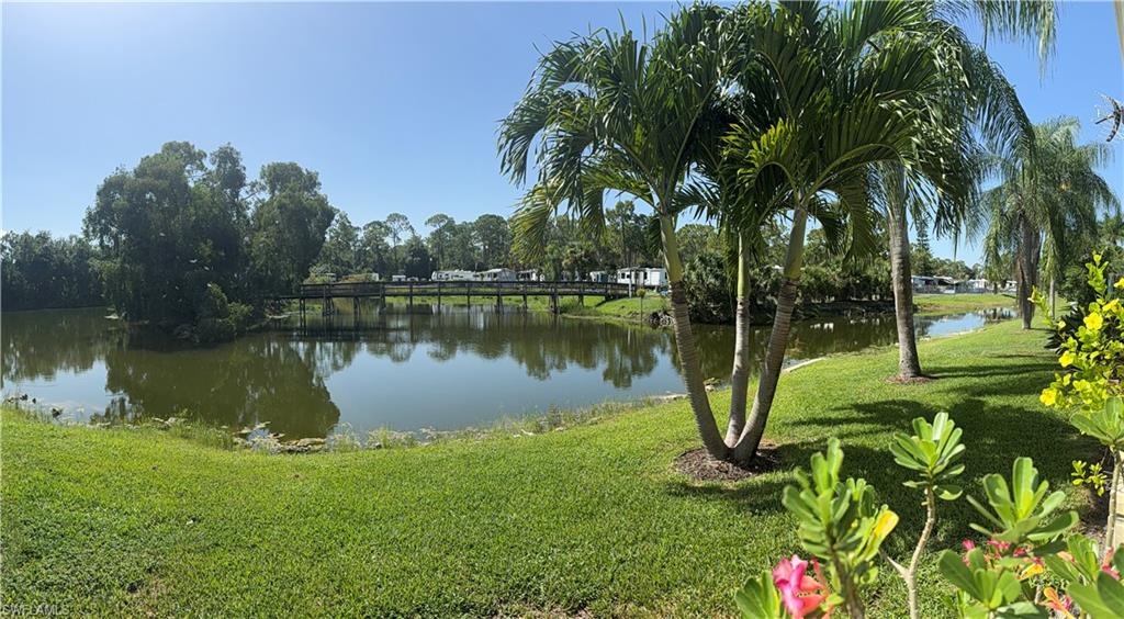 10591 Wales Loop Bonita Springs.  Manufactured home located in a 55+ Co Op community.