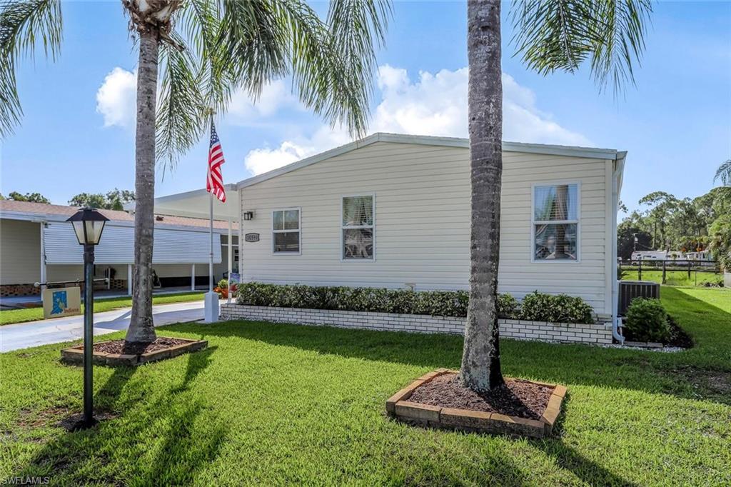 10591 Wales Loop Bonita Springs.  Manufactured home located in a 55+ Co Op community.
