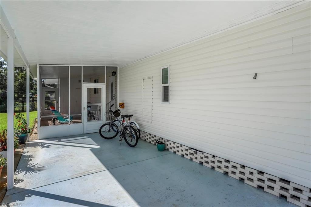 10591 Wales Loop Bonita Springs.  Manufactured home located in a 55+ Co Op community.