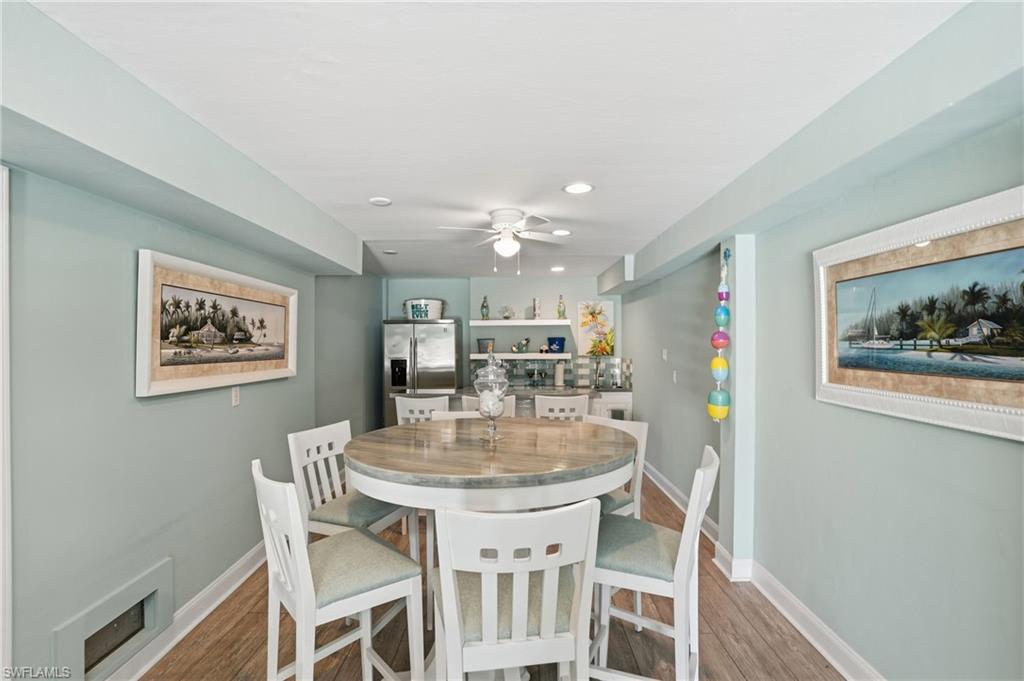 Wood-finish flooring with light blue wall paint