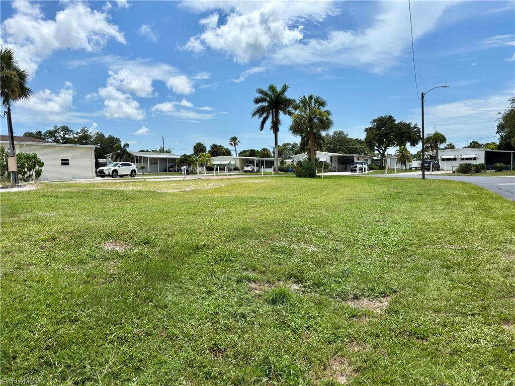 Large corner lot with existing concrete driveway