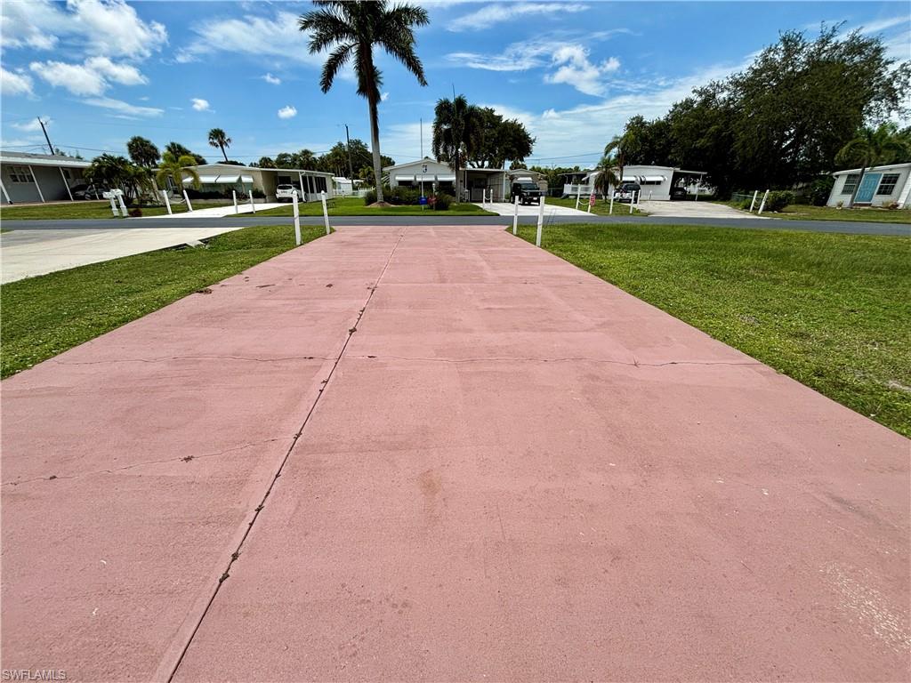 Large long driveway looking front