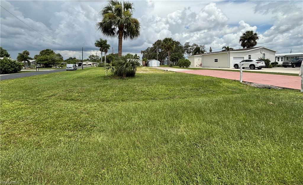 Yard is on North side of lot, front faces West, back East