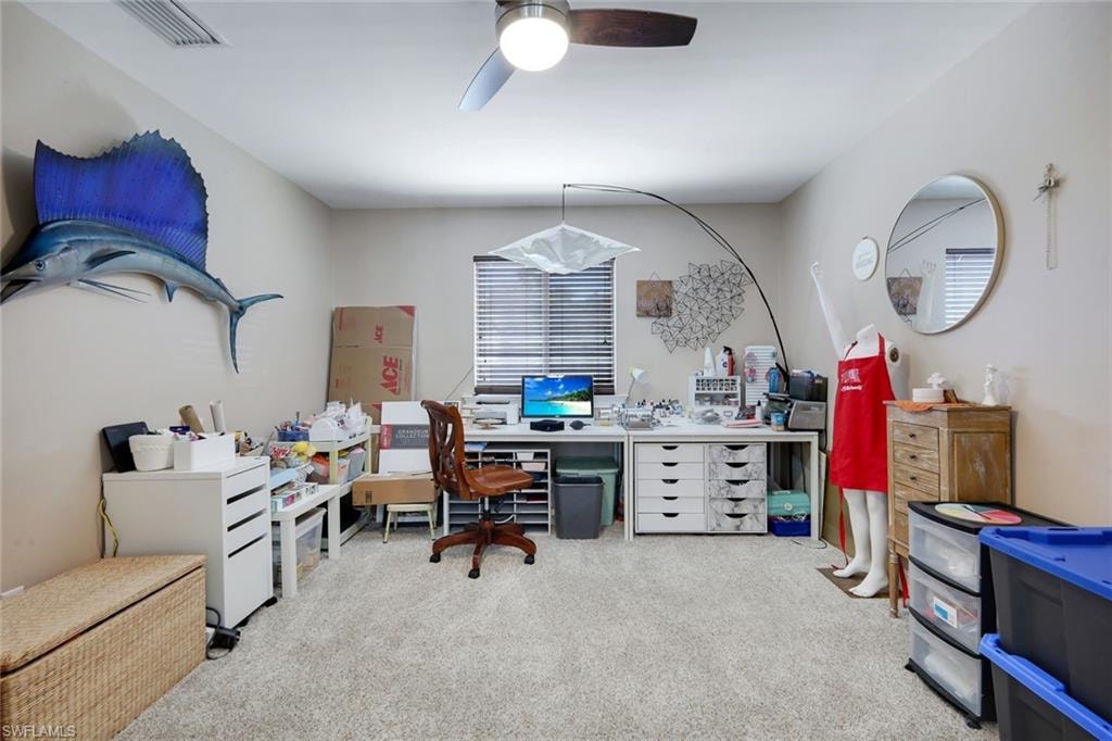 Recessed lighting, ceiling fan, and carpet flooring