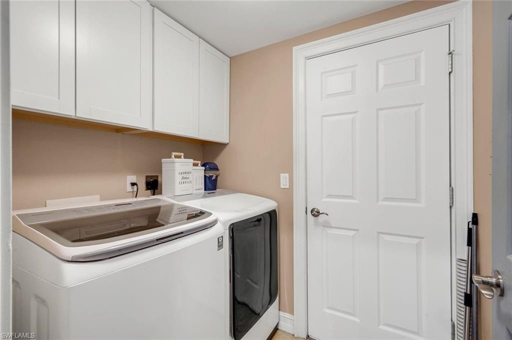 White shaker-style cabinetry with under-cabinet lighting