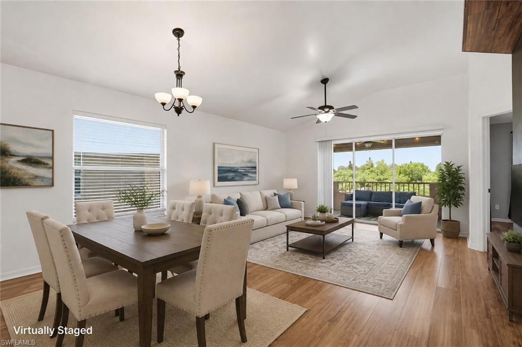 Vaulted ceilings, wood-finish flooring, and natural light