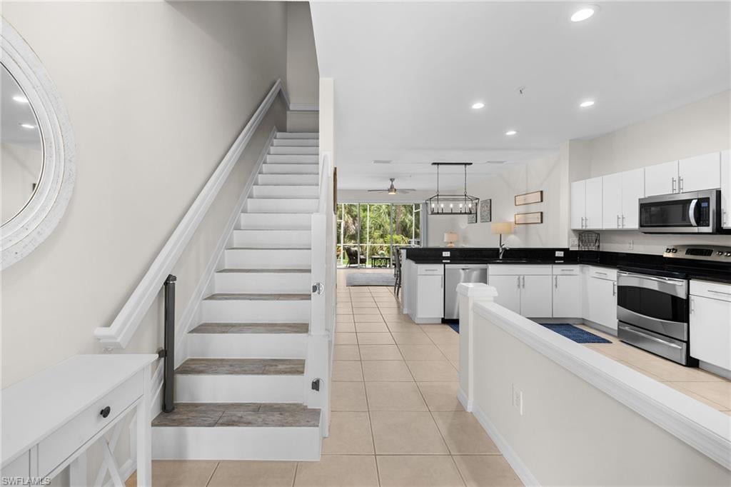 stairway leading to the 2nd floor 1/2 bath under stairway