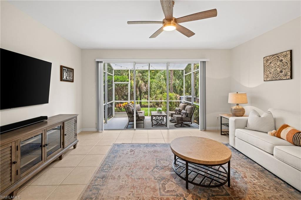 looking out to the lanai area with plenty of light in living room.