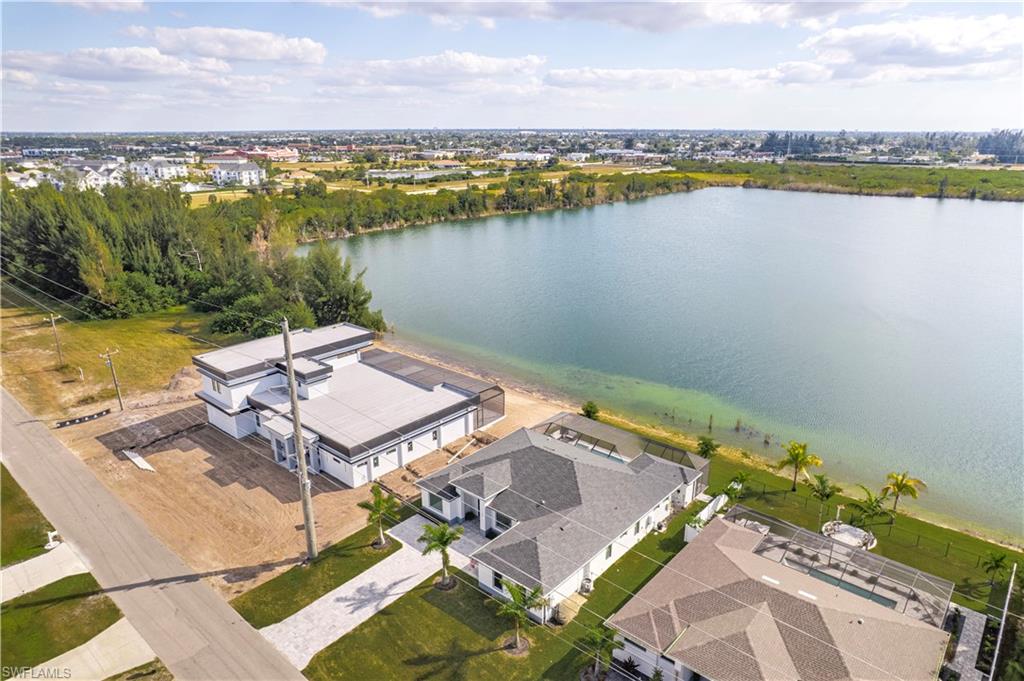 Aerial view of residential area with a nearby body of water