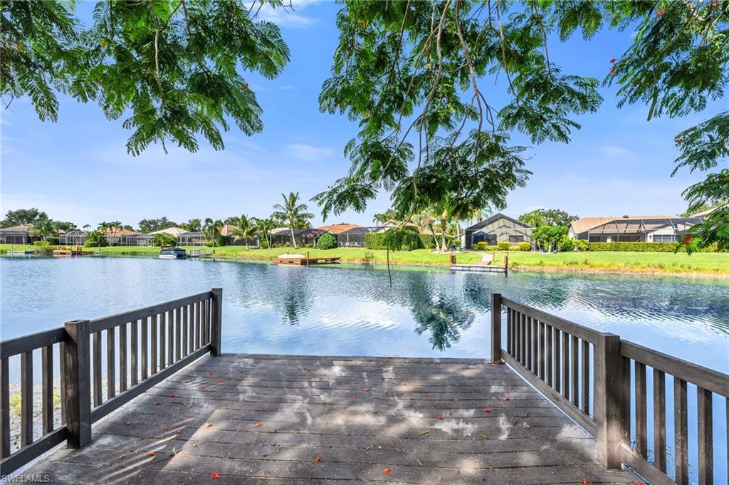 Private dock with wood-finish decking and railings
