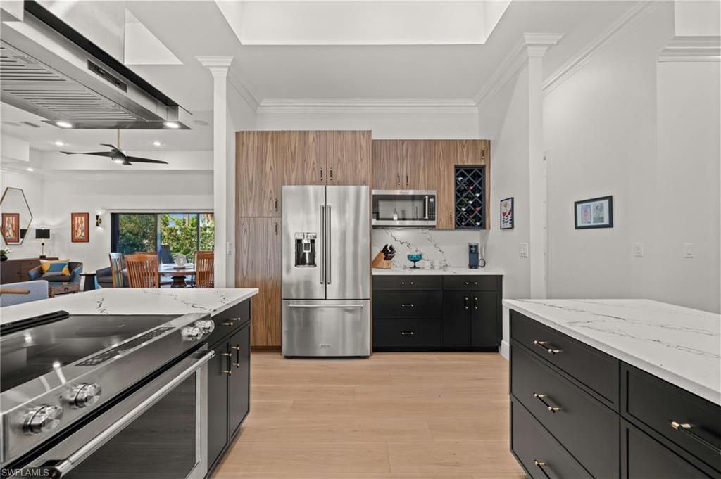 All Kitchen Aid appliances and a Convenient coffee bar next to the refrigerator