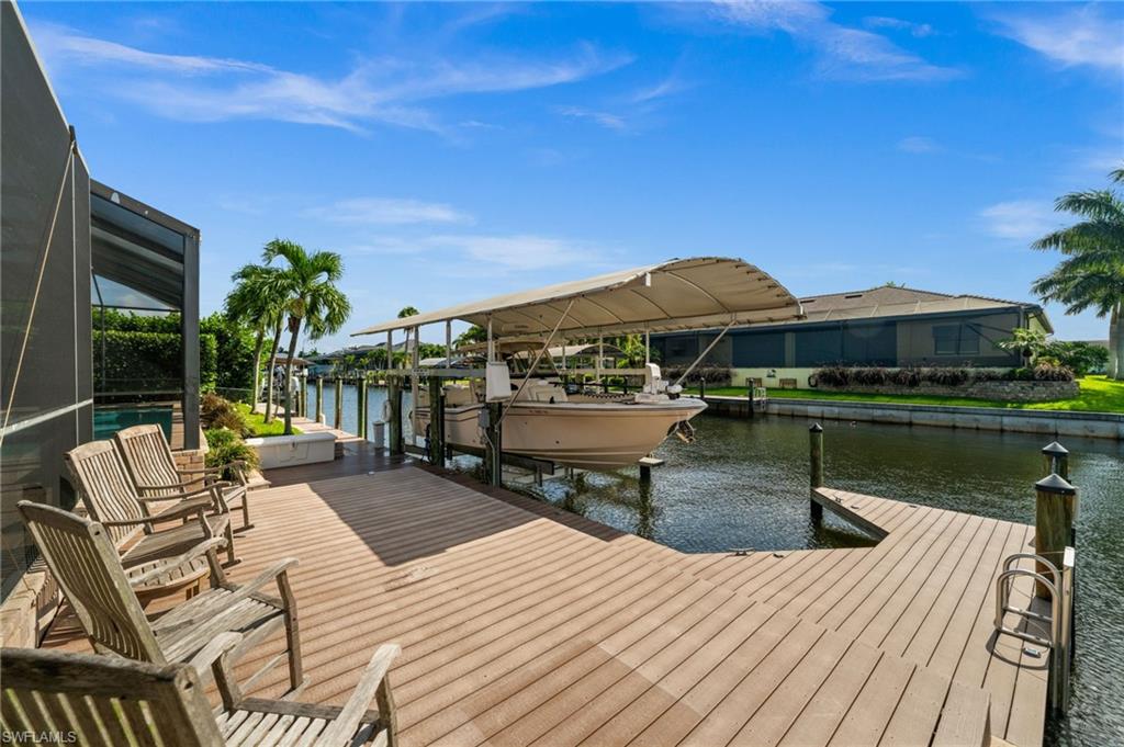 Composite dock with covered boat lift and lots of seating