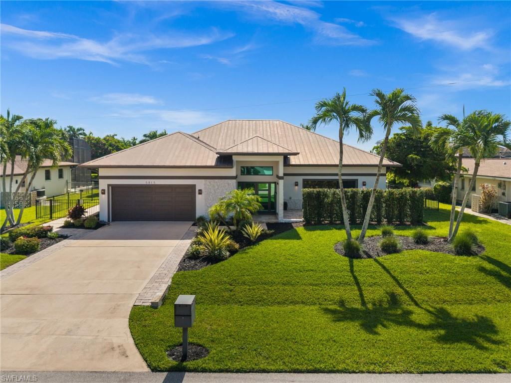 Beautiful setting with mature tropical landscaping