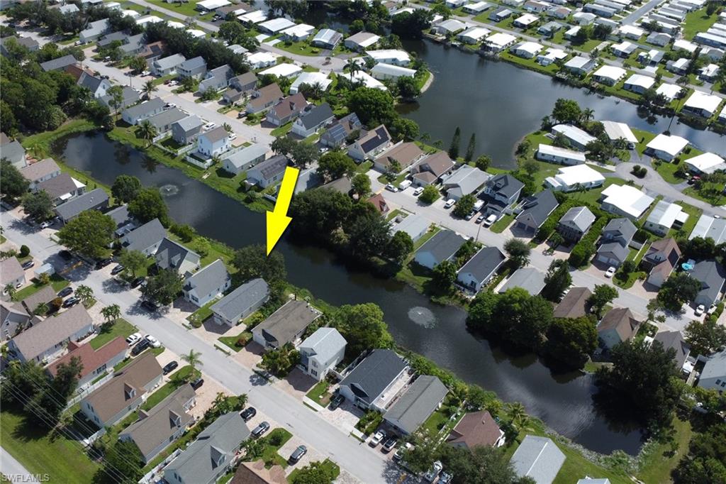 Waterfront property with mature trees and paved street access