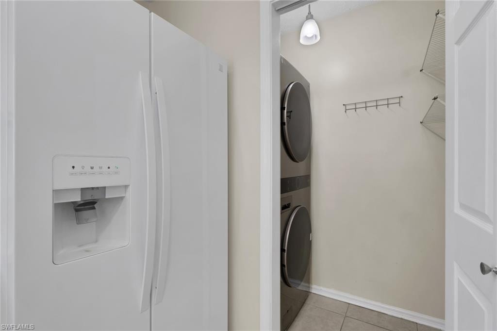 Laundry right off kitchen with closed doors