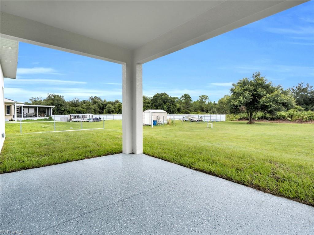 The Covered Lanai Makes A Great Area To Entertain And Have A Bar-B-Que!