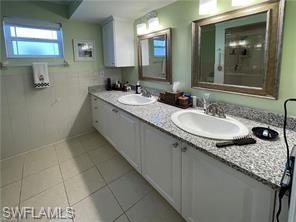 Master bath with double sinks and large walk in shower