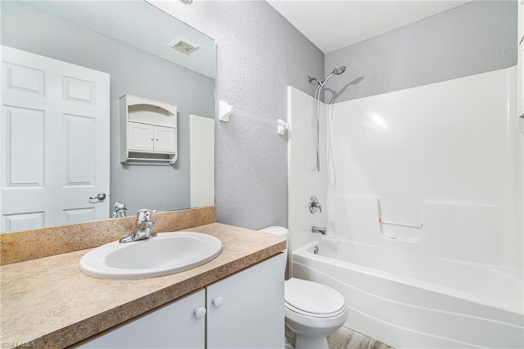 Primary bedroom private bathroom with tub/shower combo.